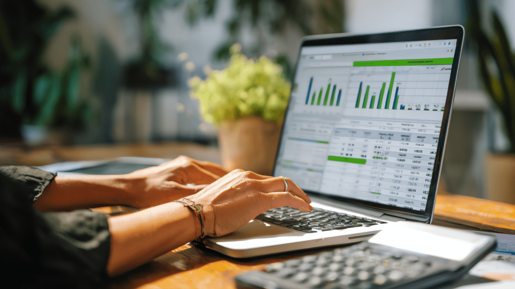 Woman working with tax spreadsheets on a computer